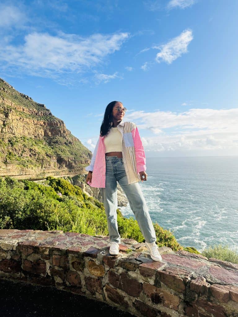 Woman standing on cliff
