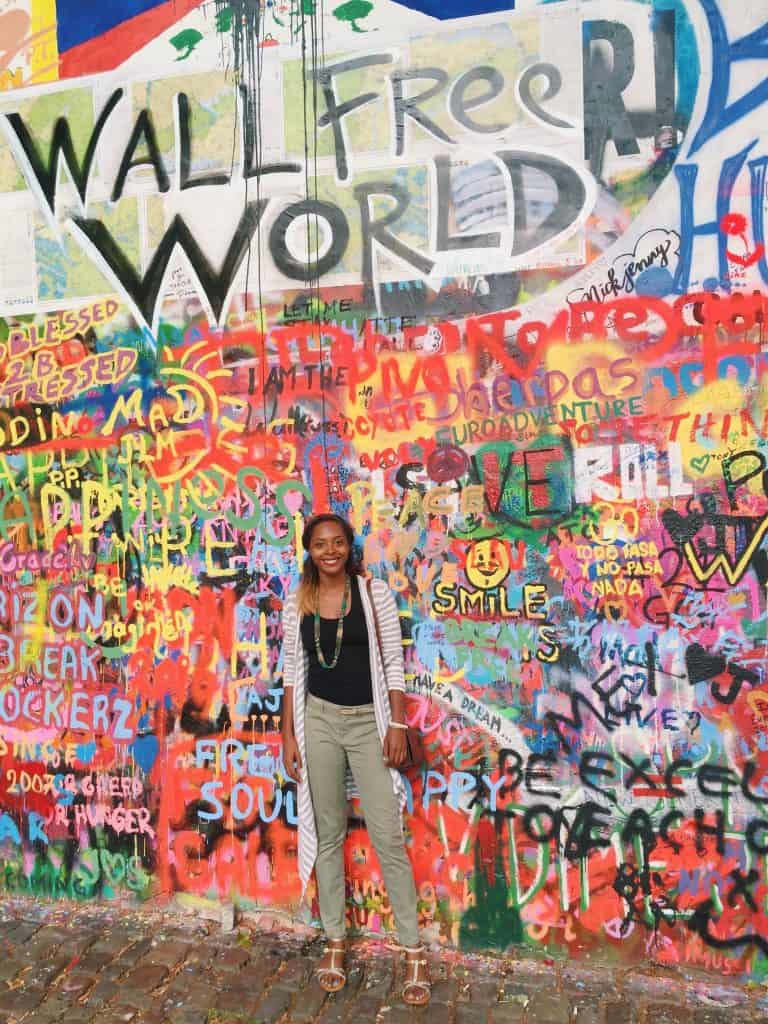 woman in front of Berlin Wall